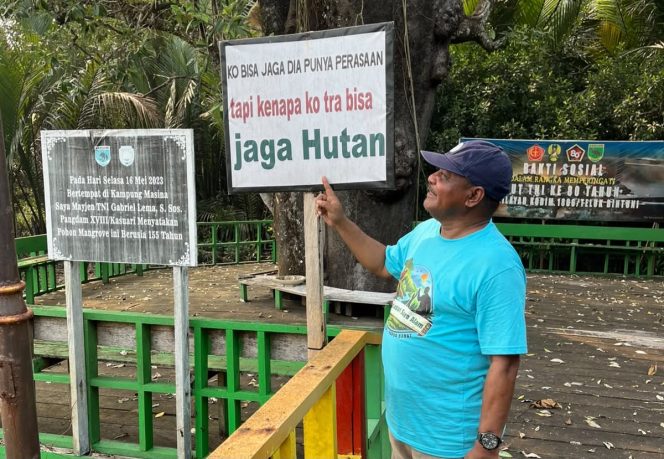 
 Dr. Ir. Petrus Kasihiw, MT selaku pembina YLSA saat berada di salah satu spot foto di kampung Masina
